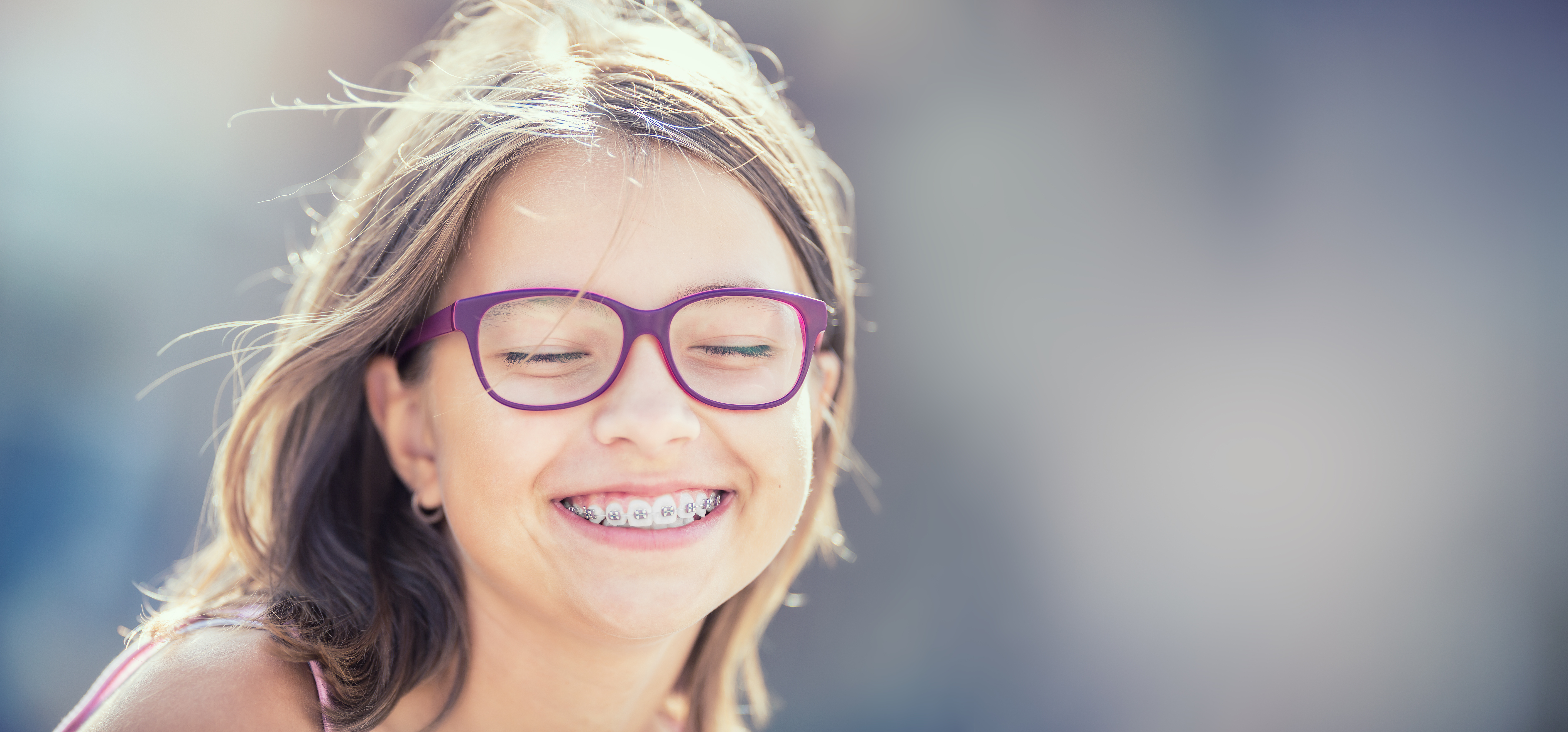 Smiling girl with braces